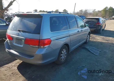 2010 Honda Odyssey Ex-L z USA, uszkodzony, nr VIN 5FNRL3H61AB045928